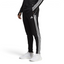 Side profile of the black Adidas Tiro 23 training pants, showcasing the slim tapered fit and the iconic white Three Stripes.