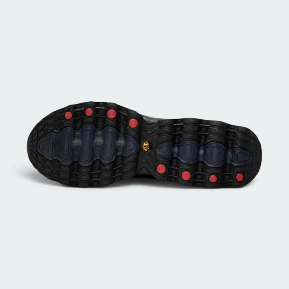 Displays the full-length black rubber outsole, showcasing the grooved traction pods designed to keep the foot close to the ground for smooth heel-to-toe transitions.