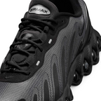 Focuses on the rear profile, highlighting the supportive plastic heel clip, debossed Dn logos, and the wide stance of the heel Air tubes.