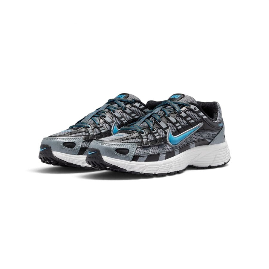 Forward three-quarter angle showcasing both shoes side by side, highlighting the aggressive millennium tech runner stance, layered toe caps, flat lacing, and contrast Dutch Blue branding hits.