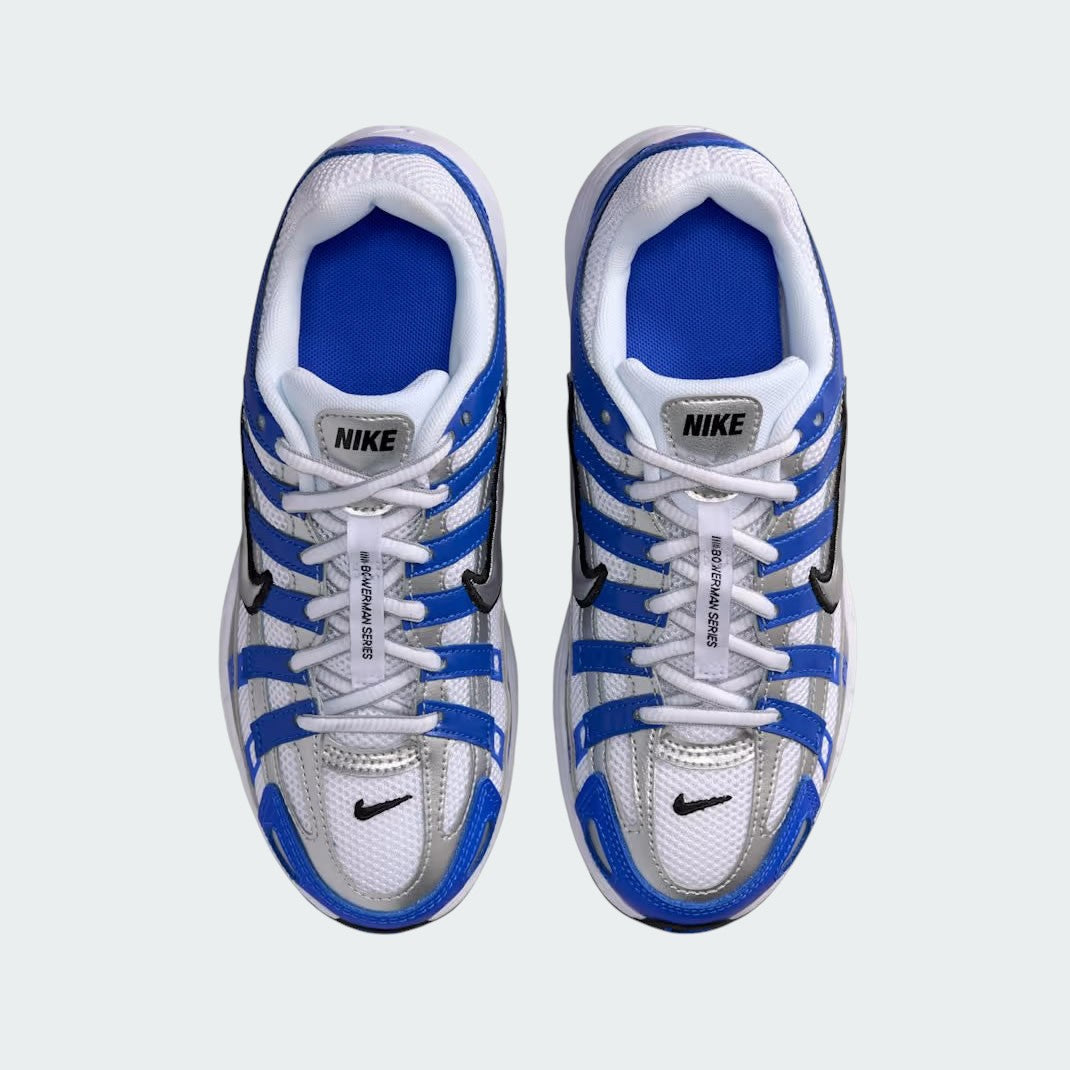 Top-down view of a pair of Nike P-6000 Juniors' trainers in blue and silver, highlighting the intricate layered upper and lace-up closure.