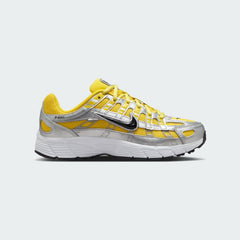 Nike P-6000 Juniors Trainers HV5064-701 side view showing yellow mesh upper and layered overlays