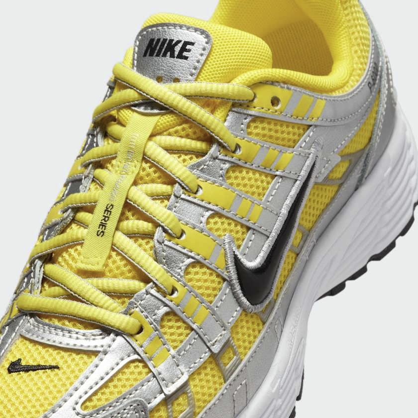 Close-up of Nike P-6000 Juniors Trainers HV5064-701 laces, mesh texture, and logo placement