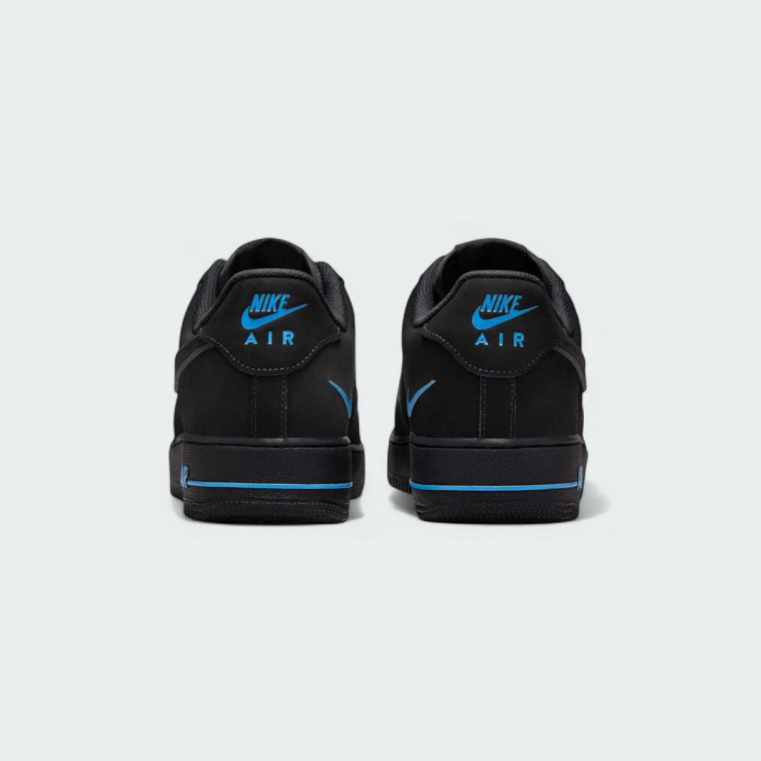 Rear view of the Nike Air Force 1 '07 Men's black trainers, focusing on the heel panel and Nike Air branding.