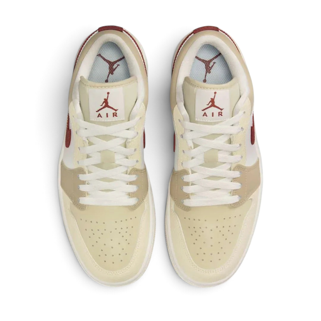 Air Jordan 1 Low White Leather Trainers HV6530-100 top view showing perforated toe box, flat laces, and padded tongue with Jumpman logo
