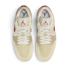 Air Jordan 1 Low White Leather Trainers HV6530-100 top view showing perforated toe box, flat laces, and padded tongue with Jumpman logo