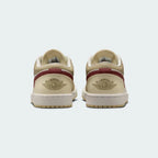 Air Jordan 1 Low White Leather Trainers HV6530-100 back view showing embroidered Wings logo on heel tab and smooth collar line