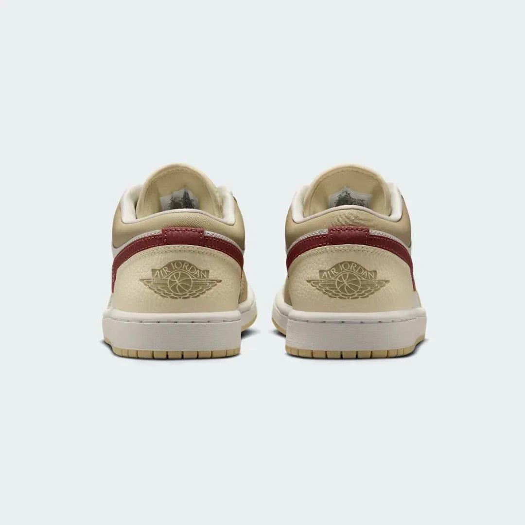 Air Jordan 1 Low White Leather Trainers HV6530-100 back view showing embroidered Wings logo on heel tab and smooth collar line