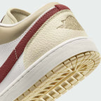 Rear underside close-up of Air Jordan 1 Low White Leather Trainers HV6530-100 heel and outsole tread pattern