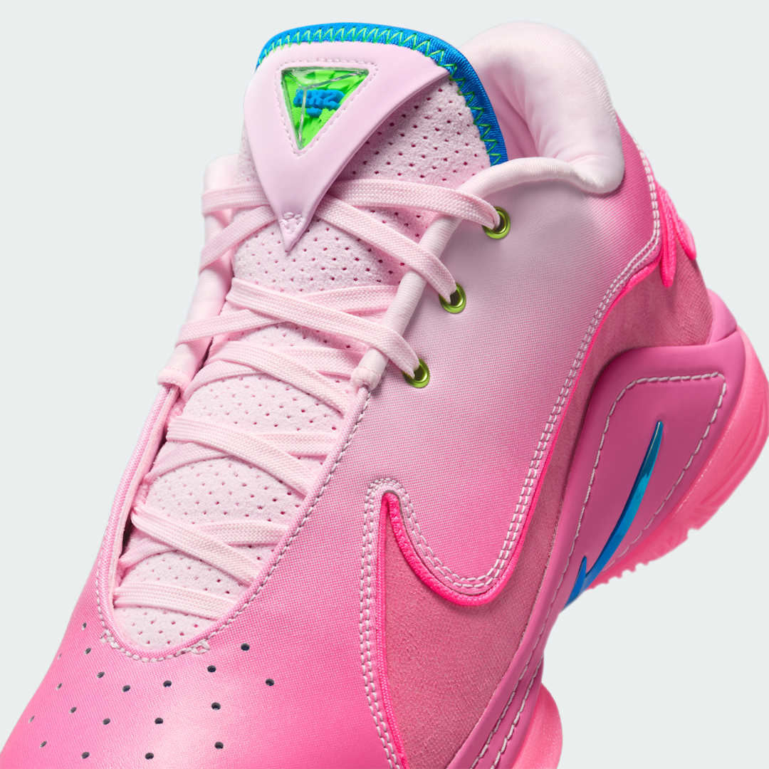 Close-up zoom on the front of the Nike LeBron XXII SN basketball trainers, showing the lacing system, textured upper materials, and forefoot details.