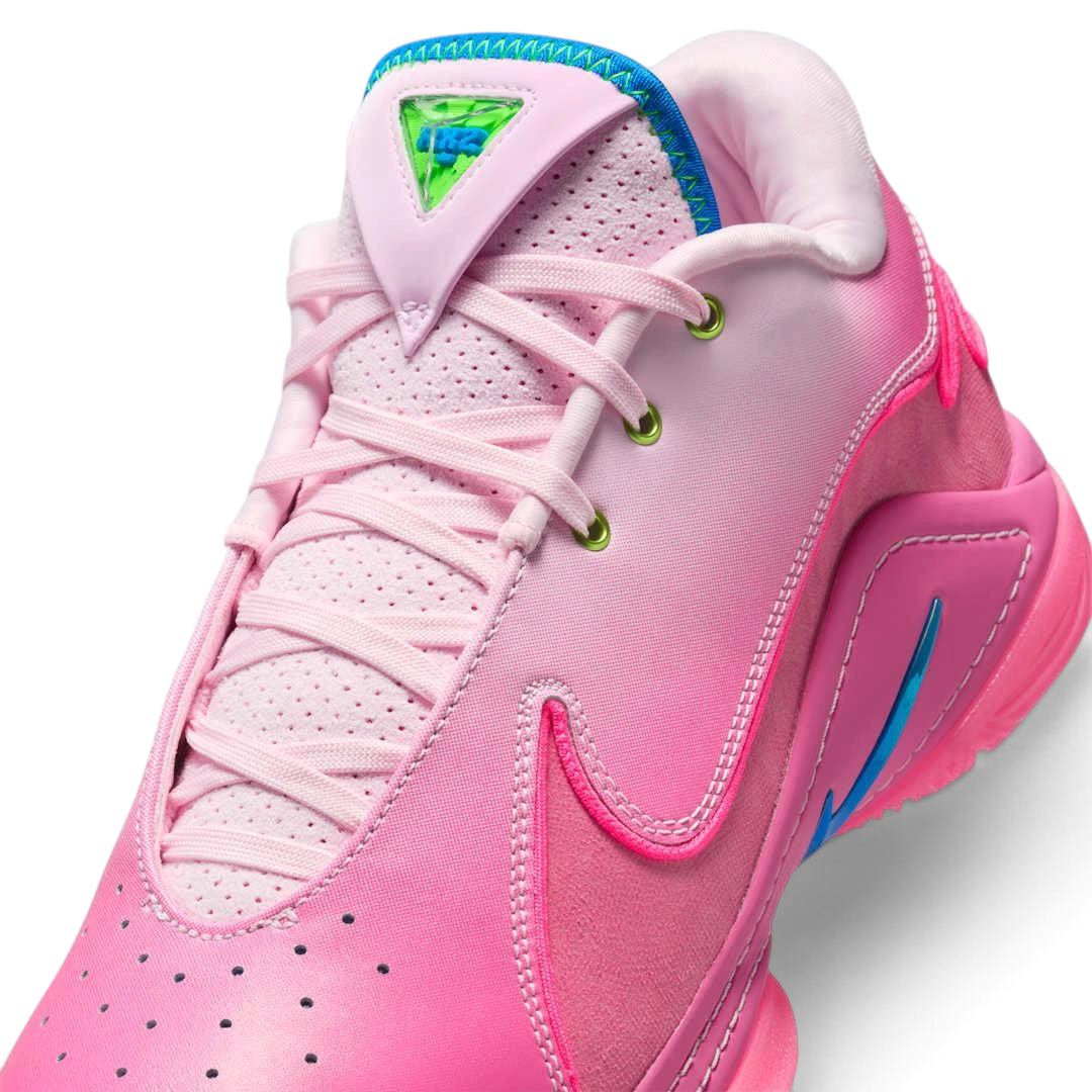Close-up zoom on the front of the Nike LeBron XXII SN basketball trainers, showing the lacing system, textured upper materials, and forefoot details.