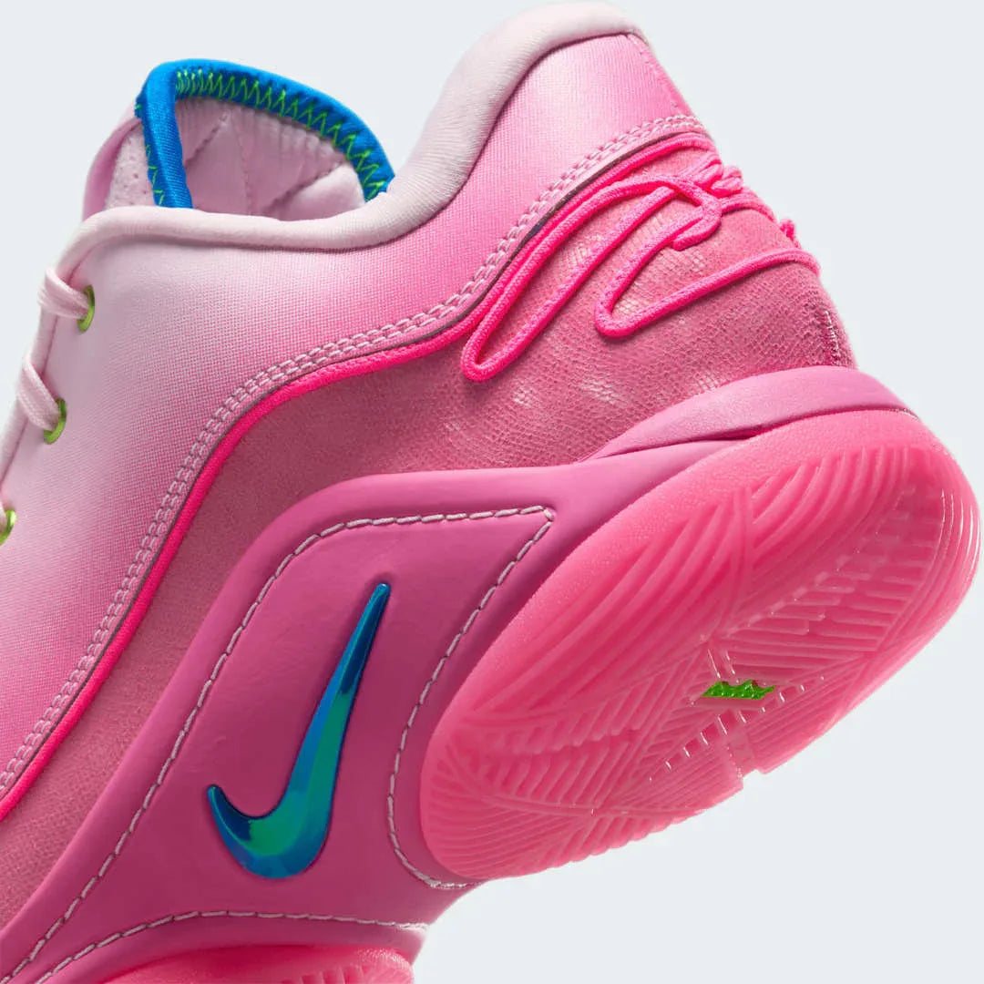 Detailed zoom on the outsole and midsole of the Nike LeBron XXII SN basketball trainers, highlighting the robust rubber traction, responsive foam, and visible Zoom Air units.