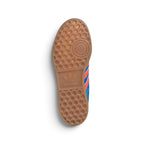 Displays the full-length Gum 3 rubber outsole, showcasing the iconic honeycomb suction lugs, forefoot pivot circle, and embossed adidas Trefoil branding across the central shank zone.
