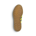 Displays the full-length gum rubber outsole, showcasing the iconic honeycomb suction lugs, forefoot pivot circle, and embossed adidas Trefoil branding across the central shank zone.