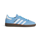 Adidas Handball Spezial in light blue suede featuring white leather three stripes, gold foil SPEZIAL branding, and a dark gum rubber sole.