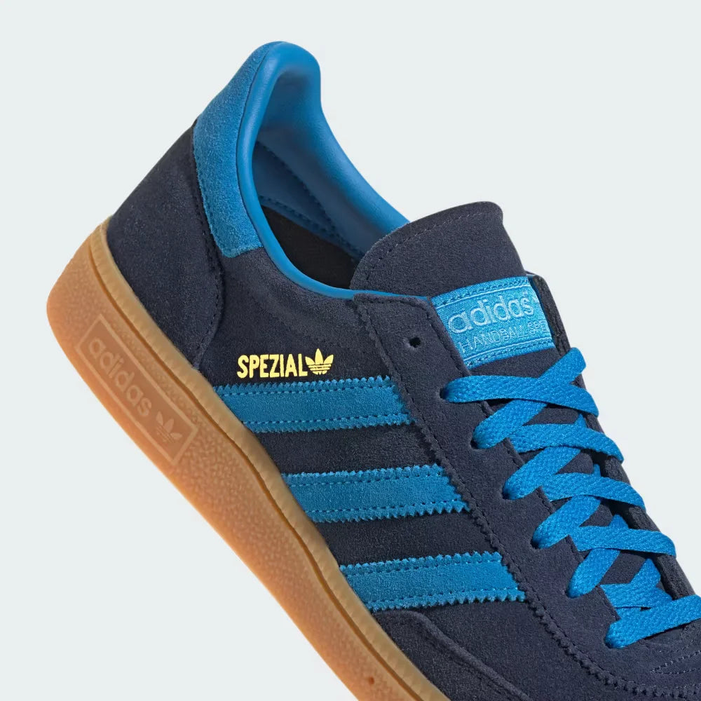Highlighting the textured nature of the gum rubber and the gold foil "Spezial" lettering.
