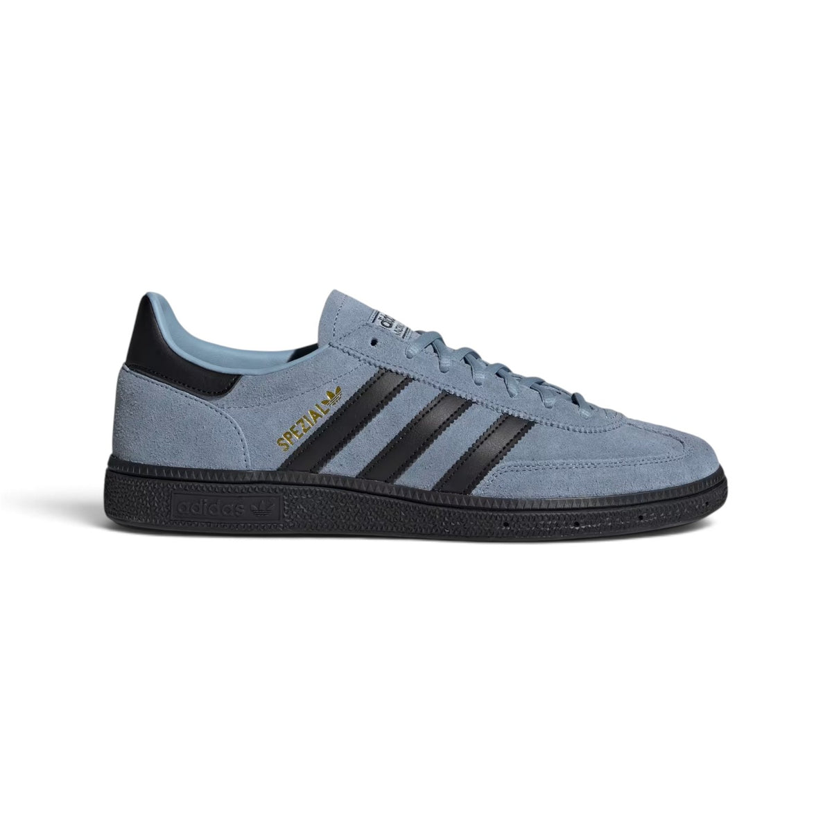 Displays the full lateral silhouette featuring the rich Tactile Blue suede upper, contrasting Core Black serrated 3-Stripes, gleaming metallic gold foil "SPEZIAL" lettering, matching black heel patch, and the solid low-profile dark rubber cupsole. Main image
