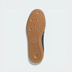 The classic Spezial hexagonal traction pattern on the durable gum-colored rubber sole.