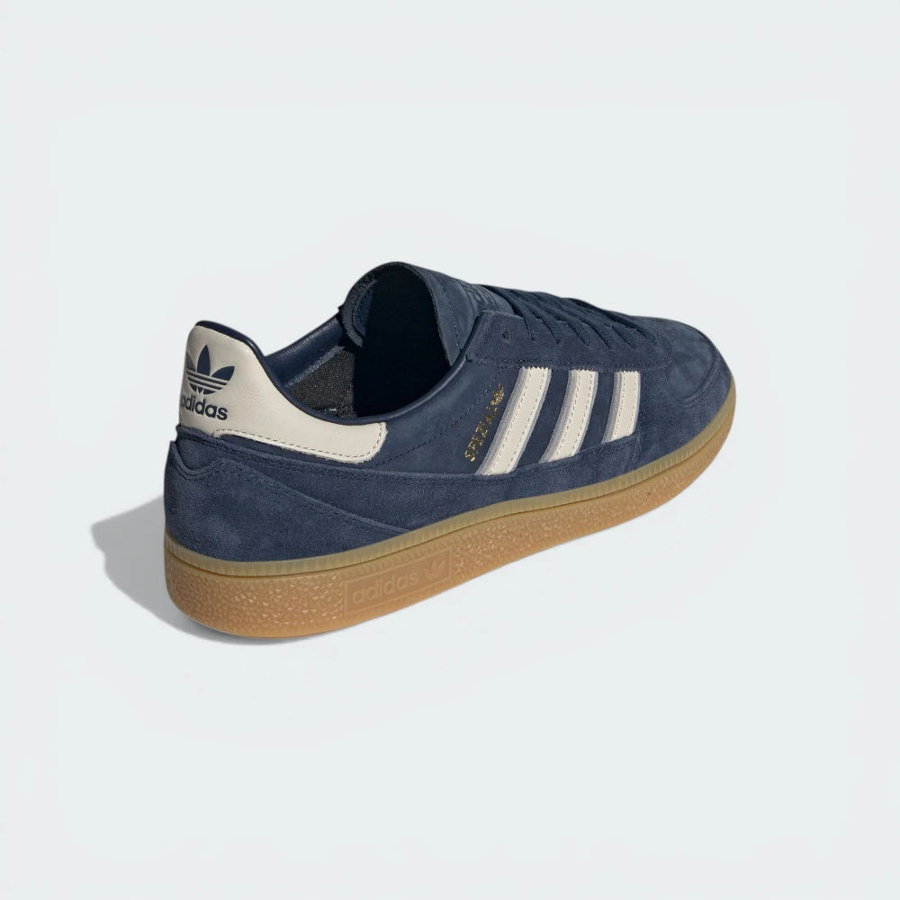 Focusing on the Bliss-colored heel tab and the clean transition into the rubber outsole.