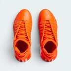 Focuses on the locked-in inner bootie layout, displaying the perfect symmetry of the black knit ankle collar, the central laces, and the premium orange toe cap guarding the front box.
