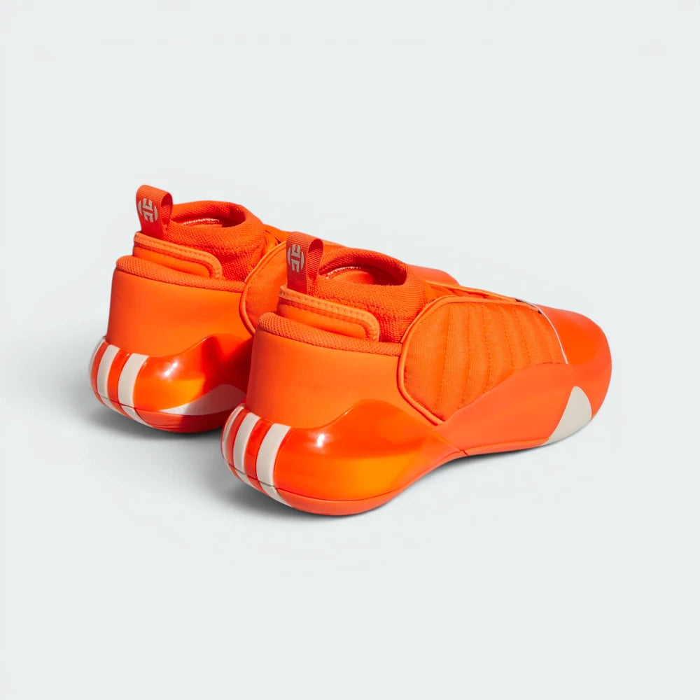 Focuses on the contoured shape of the white heel shroud, highlighting the clean, vertical black 3-Stripes branding running cleanly down the spine.