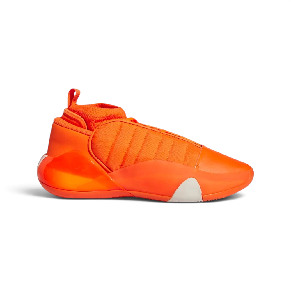 Highlights the high-velocity sweep of the quilted orange textile stitches, showing the professional integration of the matte Wonder White heel capsule and the low-slung black midsole wall. Main image