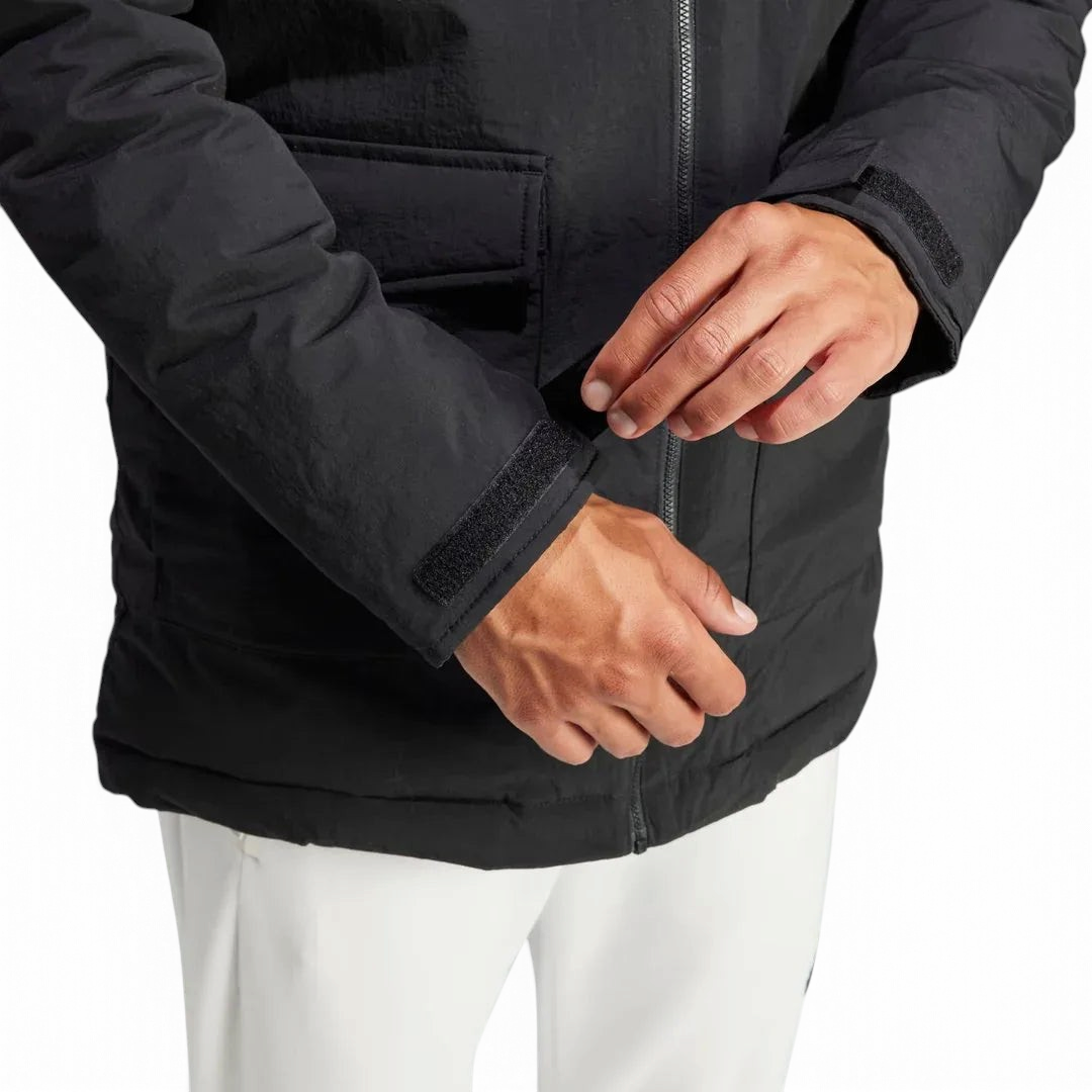Detailed zoom on the lower part of the zipper, and sleeves of the Adidas Hooded Fur Parka,, highlighting the construction.