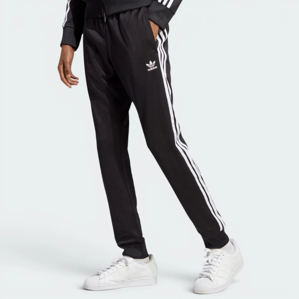 Highlights the high-velocity sweep of the iconic white 3-Stripes cascading down the professional depth of the slim black legs.