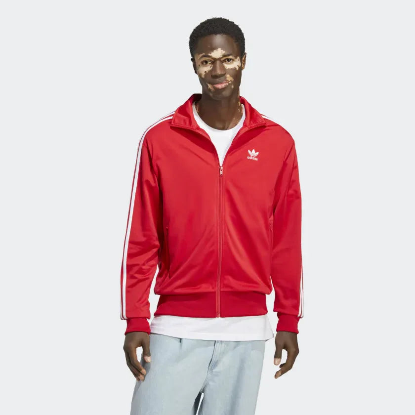 Adidas Adicolor Classics Firebird Track Jacket Men's in better scarlet red, front view showing full zip, stand-up collar, white 3-Stripes on sleeves, and embroidered Trefoil logo. Main image