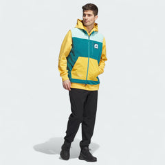 Adidas Adicross Padded Fleece Gilet Men's in emerald green, side profile showing the sleeveless design with stretchy fleece panels, designed for golf.