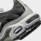Detailed zoom on the outsole and midsole of the Nike Air Max Plus TN Men's trainers, highlighting the unique Tuned Air cushioning system and rubber outsole.