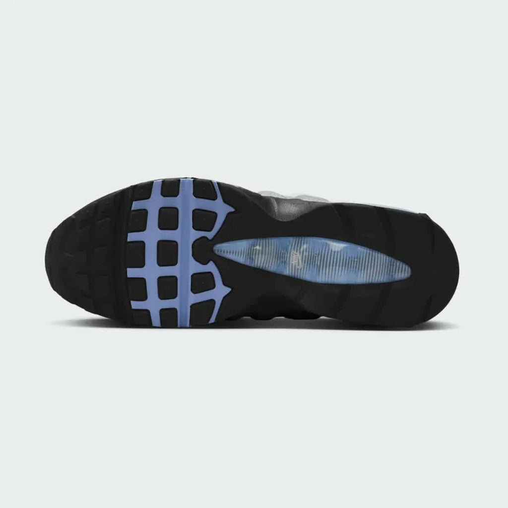 View of the outsole of the Nike Air Max 95 OG Men's grey running shoes, showing the durable rubber waffle tread pattern.