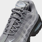 Close-up zoom on the front of the Nike Air Max 95 OG Men's running shoes, showing the intricate lacing system, mesh tongue, and layered overlays.