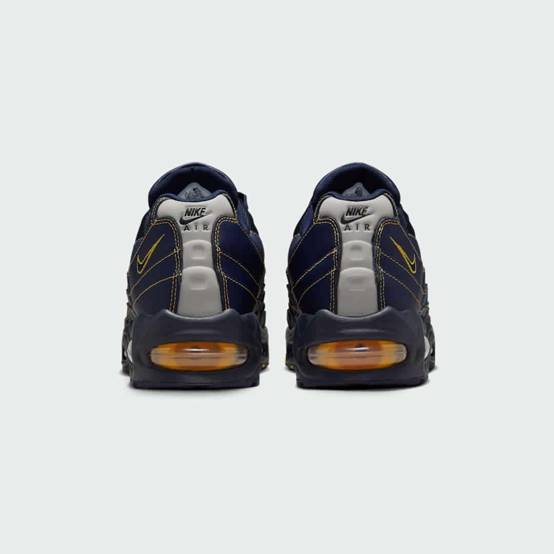 Rear view of the Nike Air Max 95 OG Men's running shoes, focusing on the prominent heel counter and Nike Air branding.