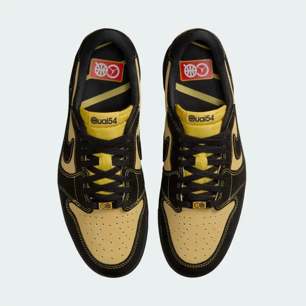 Top-down view of a pair of Air Jordan 1 Retro Low OG Q54 men's trainers, highlighting their classic silhouette and lace-up closure.