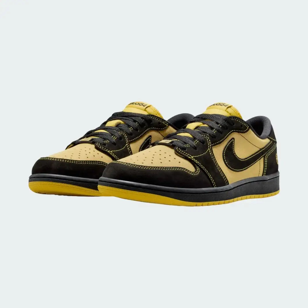 Angled view of two Air Jordan 1 Retro Low OG Q54 men's trainers in black, yellow, and red, side by side, showcasing their iconic design and Quai 54 color blocking.