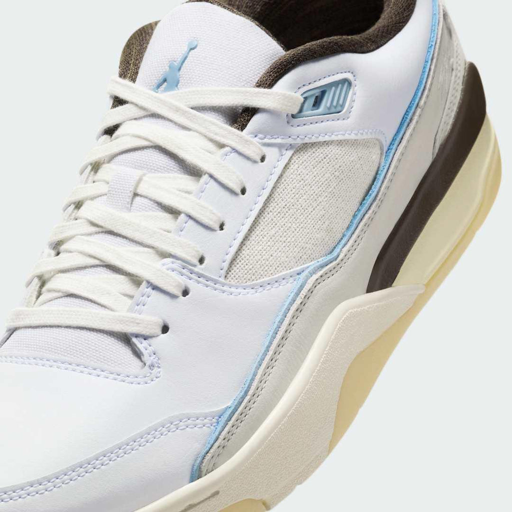 Close-up zoom on the front of the Jordan Flight Court Men's sneakers, showing the perforated toe box, lacing system, and textured leather upper.