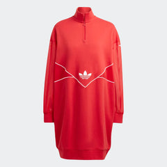 Front profile of the Adidas Archival Oversize Dress in Better Scarlet red, showing the long sleeves, ribbed cuffs, and the relaxed, modern silhouette.