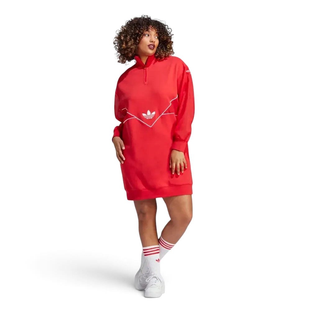 Front profile modern worn of the Adidas Archival Oversize Dress in Better Scarlet red, showing the long sleeves, ribbed cuffs, and the relaxed, modern silhouette.