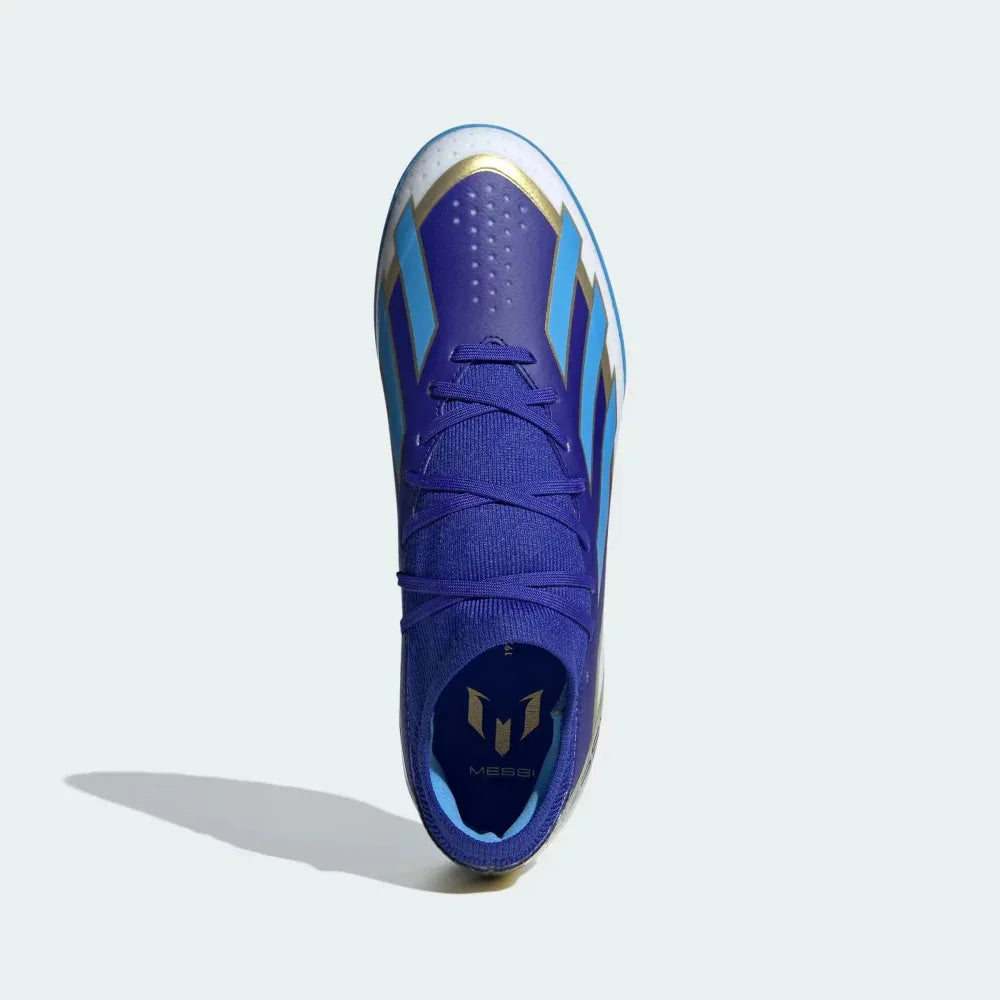 Top-down view of a pair of Adidas X Crazyfast League TF boots, highlighting their asymmetrical lacing and streamlined silhouette.