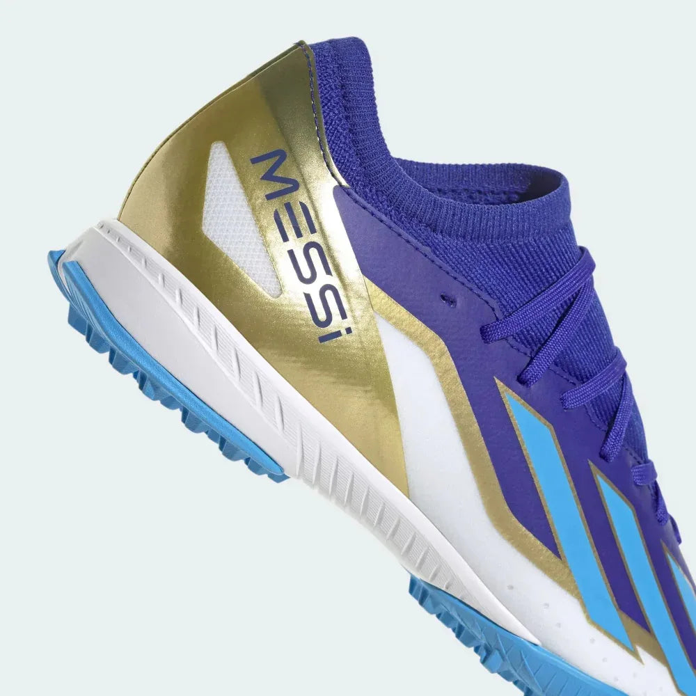 Close-up zoom on the upper of the Adidas X Crazyfast League TF boots, detailing the texture, laces, and Messi signature branding.