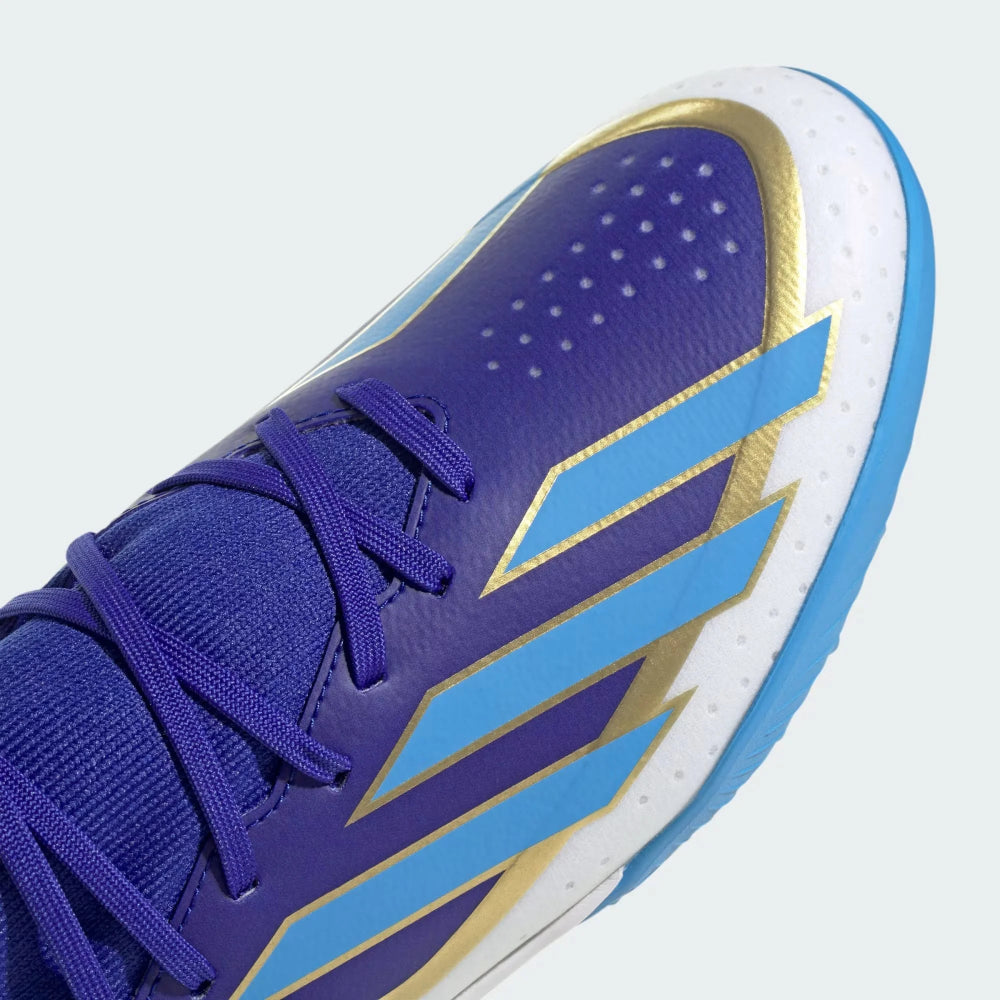 Detailed zoom on the outsole and midsole of the Adidas X Crazyfast League TF boots, highlighting the foam cushioning and rubber turf sole.