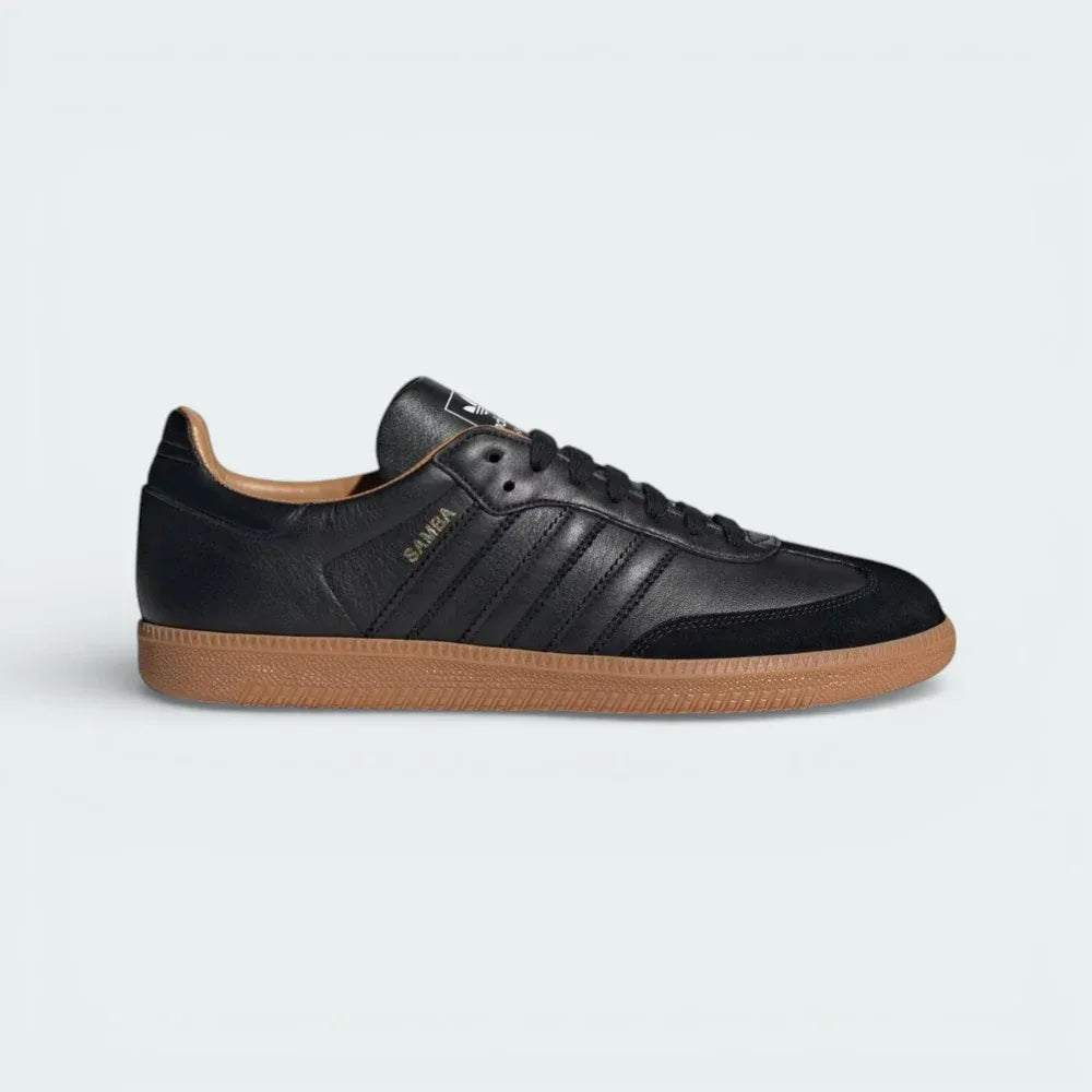 Side profile of the adidas Samba OG Made In Italy in Core Black, showing the premium Italian leather texture and the iconic white 3-Stripes.