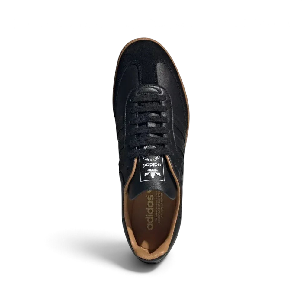 Top-down view of the Made In Italy sneakers, highlighting the elegant T-toe design, black laces, and the luxurious leather finish.