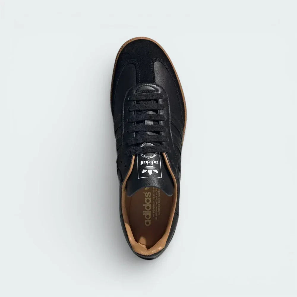 Top-down view of the Made In Italy sneakers, highlighting the elegant T-toe design, black laces, and the luxurious leather finish.