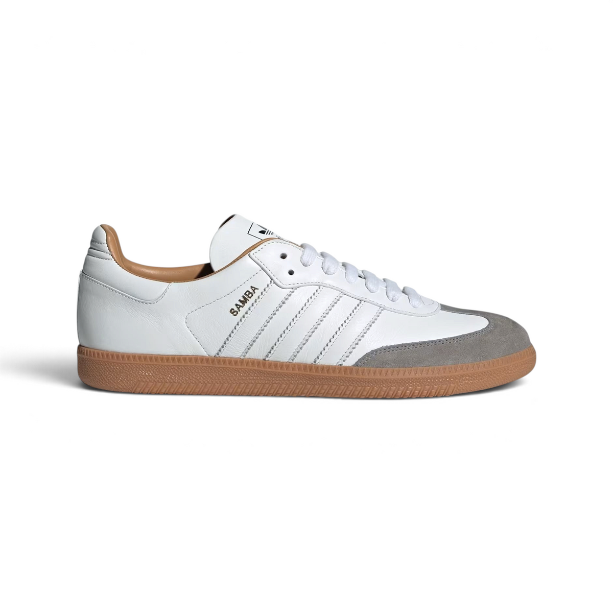 Highlights the high-velocity sweep of the Core White leather 3-Stripes, showing the professional, smooth matte texture of the premium Italian Core White leather base and the clean integration of the low-profile gum rubber outsole. Main image