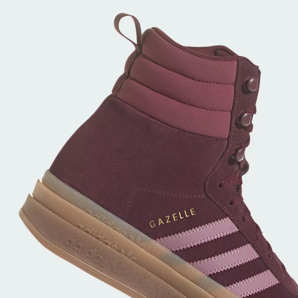 Highlighting the textured nature of the rubber and the high-quality gold foil detailing.