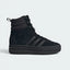 Showcases the high-velocity aesthetic of the triple-stacked rubber platform sole and the premium depth of the matte black textures.