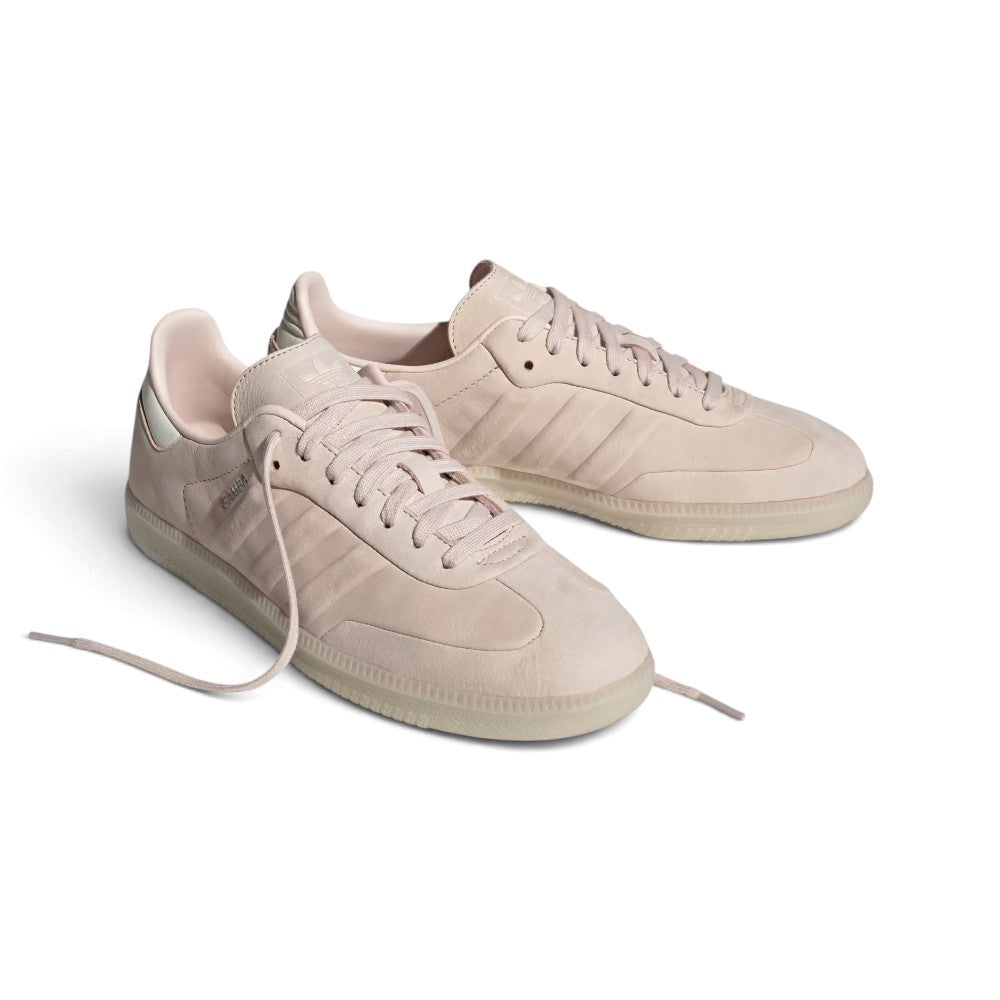 Angle View Showing Details Side by Side: Angled front-three-quarter perspective capturing the clean tonal toe overlay, smooth side panels, and integrated minimalist striping.   