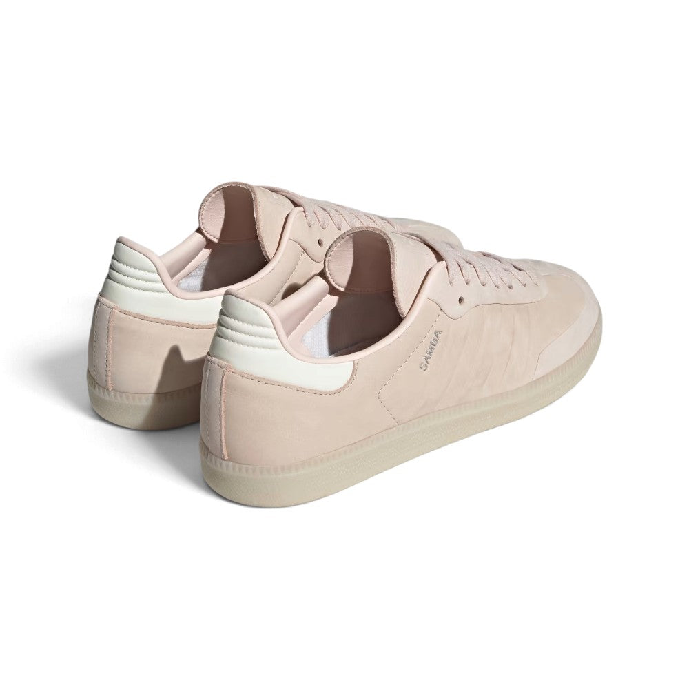 View from Behind Looking at the Rear: Rear-facing perspective focusing on the off-white contrast heel tab, stitched rear collar seams, and the clean sidewall wrap of the gum sole.   